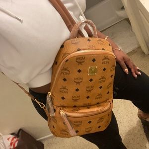 Cognac MCM sling over bag